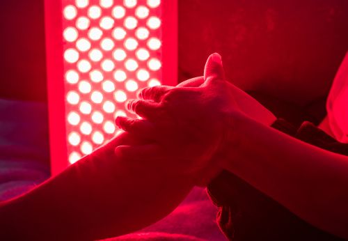 Someone receiving red light therapy for psoriasis